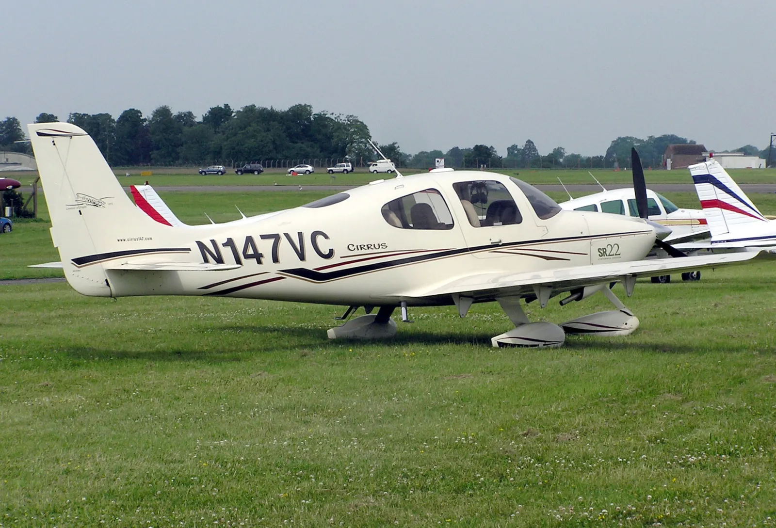 Cirrus SR22 aircraft in flight showing modern composite construction and sleek design