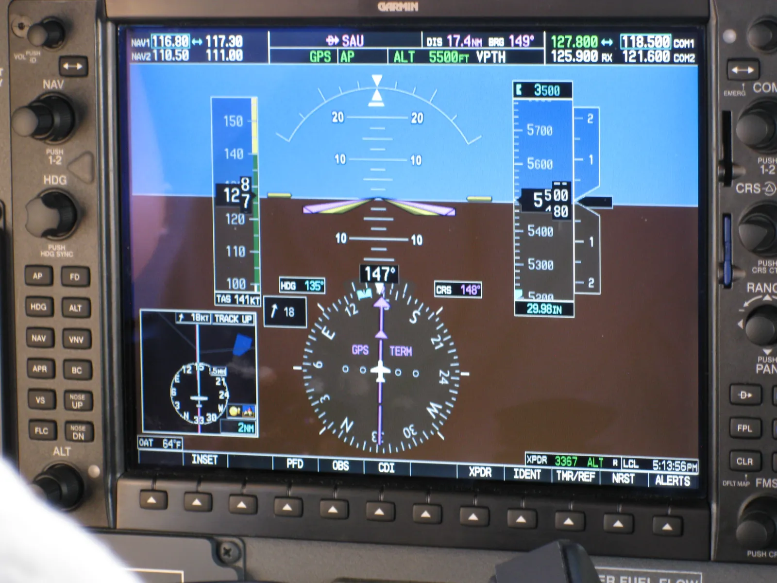 Modern Garmin G1000 glass cockpit display in a general aviation aircraft showing digital flight instruments